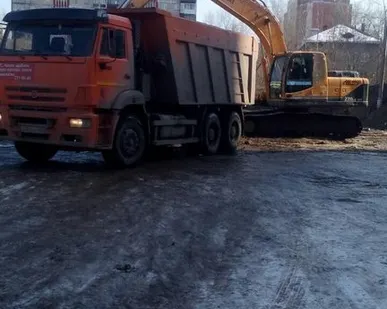 фото Вывоз снега с территории самосвалами