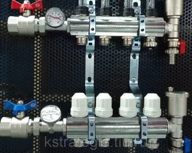 фото Коллектор блок коллекторный 11/4*3/4 на 4 выхода с расходомерами