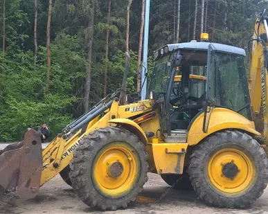 фото Аренда экскаватора-погрузчика New Holland B115, Москва