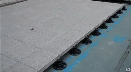 Фото №0 Устройство эксплуатируемой кровли из керамогранита на регулируемых опорах