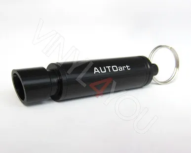 фото Брелок выхлопная труба черная