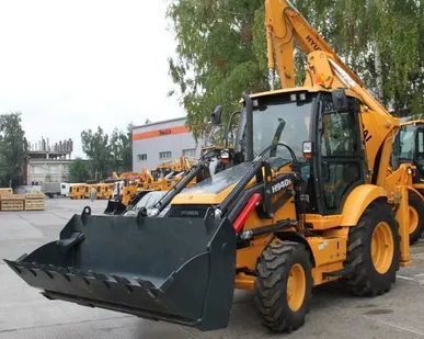 фото Аренда экскаватора-погрузчика гусеничного