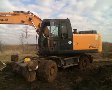 фото Аренда экскаватора колесного 1 куб