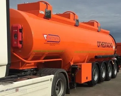 фото Цистерна SF4332 (32м3, 3 отс., 4-х осный, нагрузка на тележку 26 тонн)