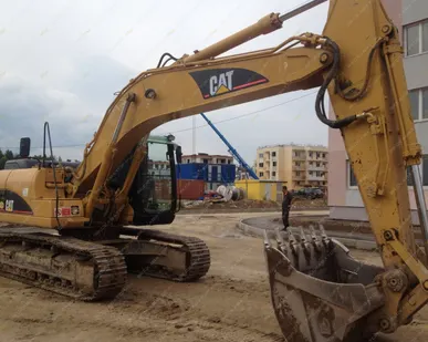 фото Аренда гусеничного экскаватора Caterpillar 320C LN, Москва