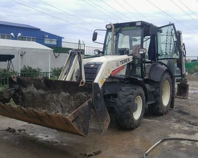 фото Аренда экскаватора погрузчика TEREX 860