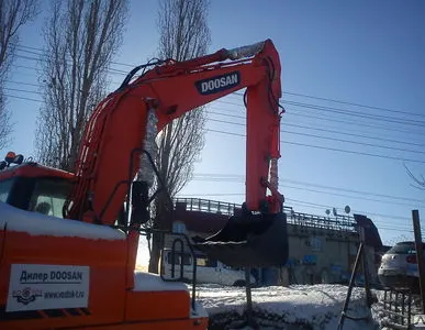 фото Колесный Экскаватор Doosan (Дусан) DX 160 W на пневмоходу