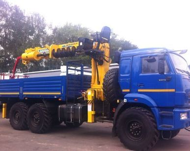 фото КМУ КАМАЗ 43118-3090-46+SOOSAN SCS866 в.у. + буровая уст.. + борт сталь 6.2