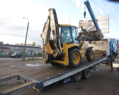 фото ЭВАКУАЦИЯ ТРАКТОРОВ МТЗ JCB ЭВАКУАТОР 10 ТОНН НИЗКОРАМНЫЙ С ЛЕБЁДКОЙ МОСКВА