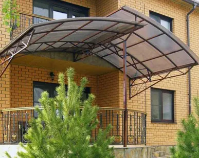 фото Кованный козырек