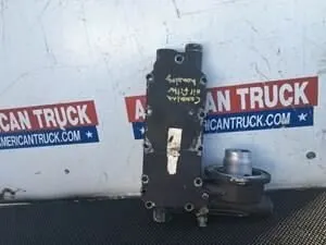 фото основание использованного масляного фильтра с крышкой масляного радиатора