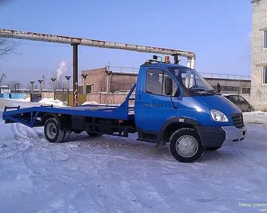 фото Эвакуатор c ломаной платформой на базе ГАЗ-33106