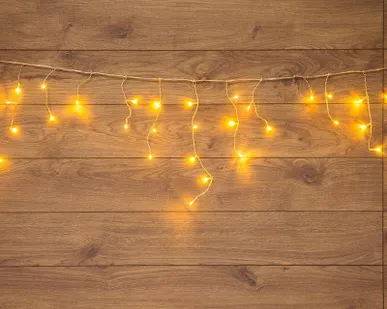 фото Гирлянда "Айсикл" (бахрома) 1.8х0.5м 48LED тепл. бел. 3Вт 230В IP20 провод прозр. Neon-Night 255-016