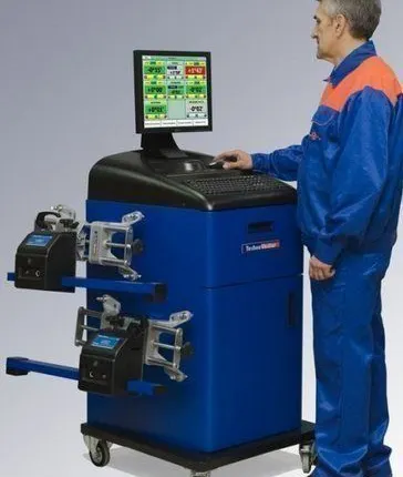 Фото №0 Стенд развал-схождения ТехноВектор T5216 R