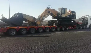 Фото №0 Низкорамный трал, услуги перевозка спецтехники.