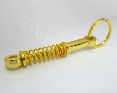 фото Брелок стойка золотая/желтая