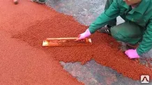 фото Укладка
 резинового бесшовного покрытия
