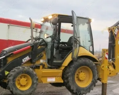 фото Аренда экскаватора-погрузчика Caterpillar 428E, Санкт-Петербург