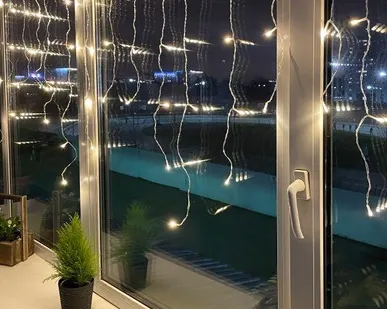 фото Гирлянда светодиодная "Бахрома" 2мх1м 62LED 24В  IP44( без трансформатора  Б0041911) тепл. свет ЭРА Б0041907