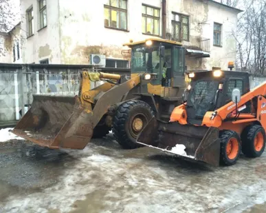 фото Вывоз снега с погрузкой
