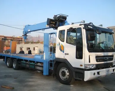 фото Эвакуатор Daewoo Novus (2014 г.в.) 9.5т с КМУ Dongyang 1926 (2014 г.в.) 7 т
