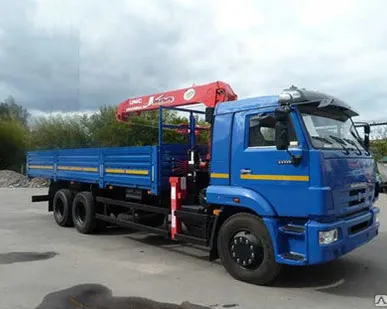 фото Бортовой КАМАЗ 65117-23 с КМУ UNIC UR V-554
в