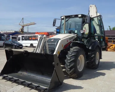 фото Аренда экскаватора-погрузчика Terex 970 Elite
