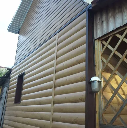 Фото №0 Обшивка дома сайдингом