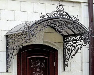 фото Козырек кованый