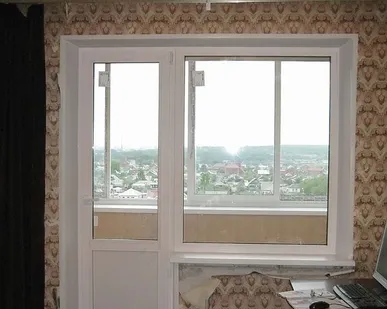 фото Балконный блок с глухим. окном  ПВХ в панельном доме под ключ 2100*2000