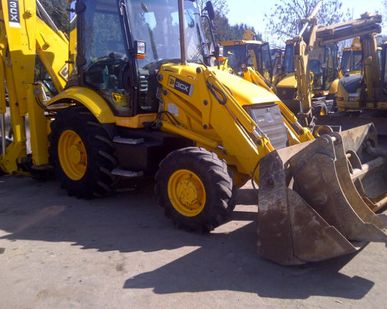фото Аренда Экскаватора погрузчика JCB Ямобур, бара Гидромолот
