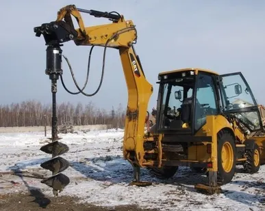 фото Бурение ям под столбы