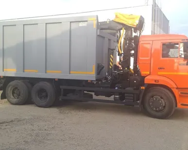 фото Автомобиль-металловоз 65115-3094-23 с КМУ ОМТ-97М