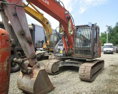 фото Экскаватор HITACHI-ZX135US