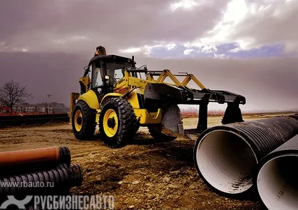 Фото №0 Экскаватор-погрузчик New Holland B115B