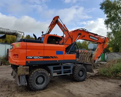 фото аренда колесного экскаватора с гидромолотом