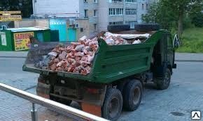 фото Вывоз строительного мусора спецтехникой