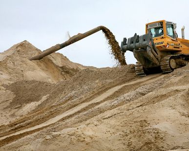 фото Песок строительный крупнозернистый 0-5