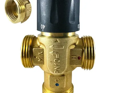 фото Термостатический смесительный клапан для систем отопления и ГВС STI 1" НР (3/4" ВР) 25-50°С